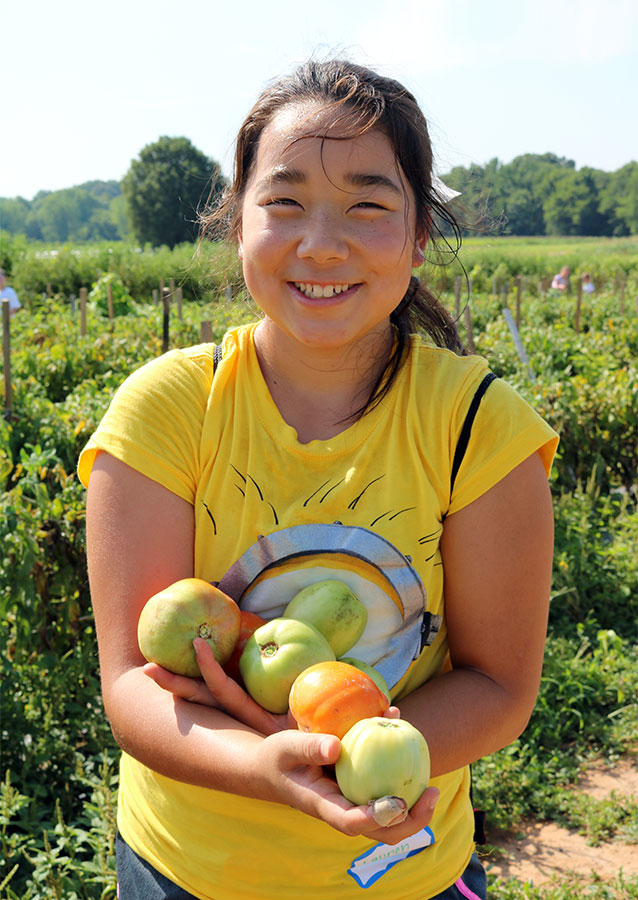 Young gleaner at Barbee Farms