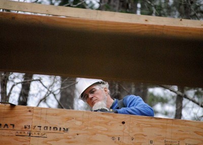Amish craftsmen raise a building for the 4-H at Millstone Camp