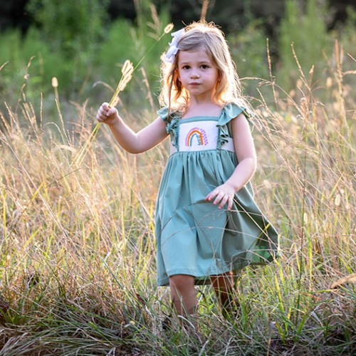 Cara enjoys playing in the fields, picking the local wildflowers and grasses in the warm sunshine. —Andrea Robson, Waxhaw, Union Power Cooperative