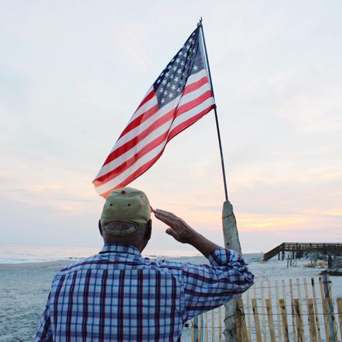 My grandfather, Sgt. Ray Jackson, salutes the flag on Ocean Isle Beach on Veteran’s Day. —Bailey Martin, Huntersville, Blue Ridge Energy