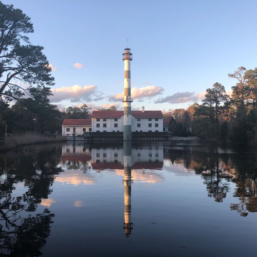 A once-grand hunting lodge perches on the edge of Lake Mattamuskeet with its striped, 12-story observation tower. —Breanna Walker