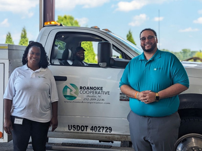 (Left to right) Kenan Fellow Dawn Stokes with Corey Hayes and Basil Williams of Roanoke Cooperative during her internship. 