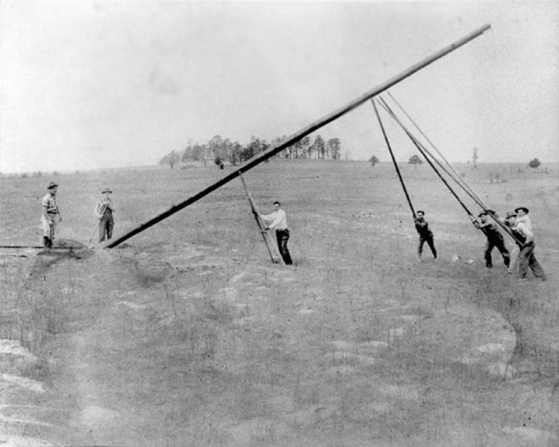Cooperatives nationwide hired local men to help raise poles that first brought electricity to rural areas. 