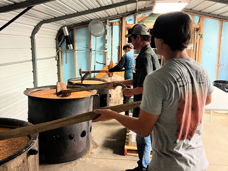 Brunswick Stew Trio-of-pot-stirring