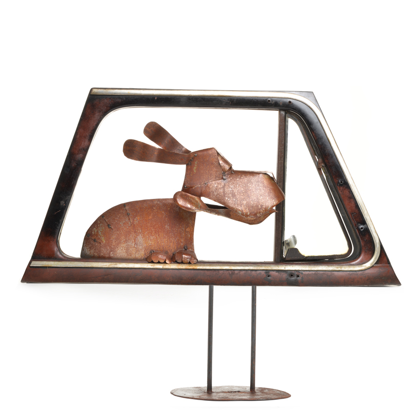 /Dave Taylor Dog-in-Door Sculpture