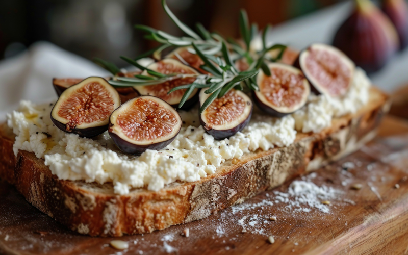 Roasted figs on toasted bread with ricotta seasoned with salt and pepper