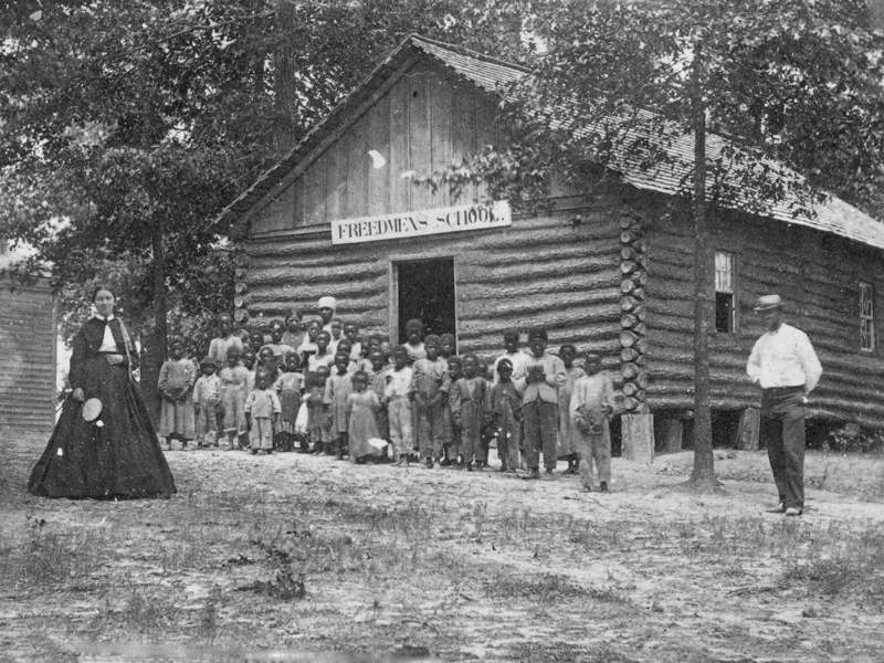 Early school in the colony would have been similar to this Freedmen's School in New Bern (c. 1868).