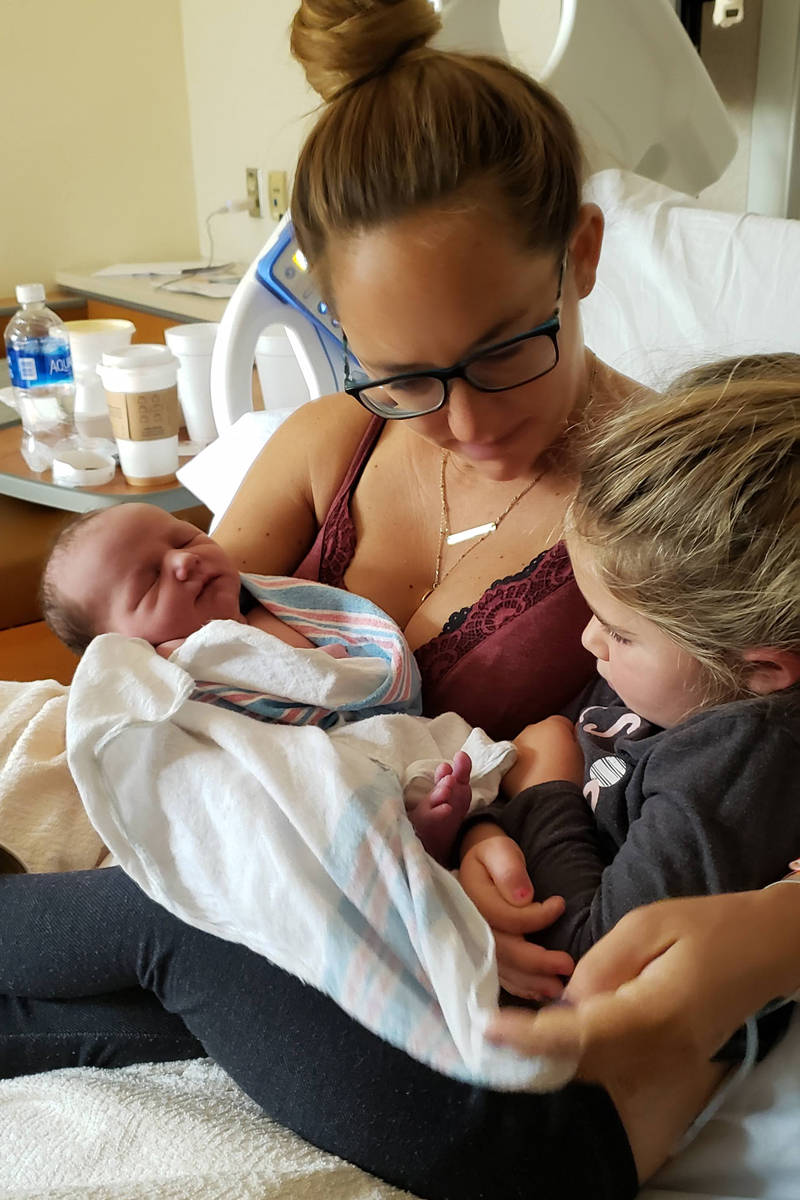 Big sister meets little brother - Kimberly Farmer