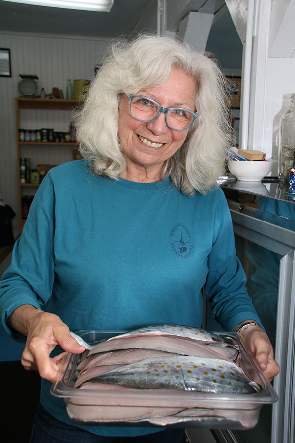 Pattie Johnson Plyler and a sampling of fresh wild caught seafood