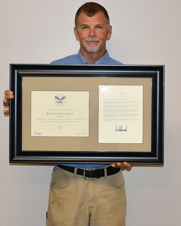 President Vol Award Dennis