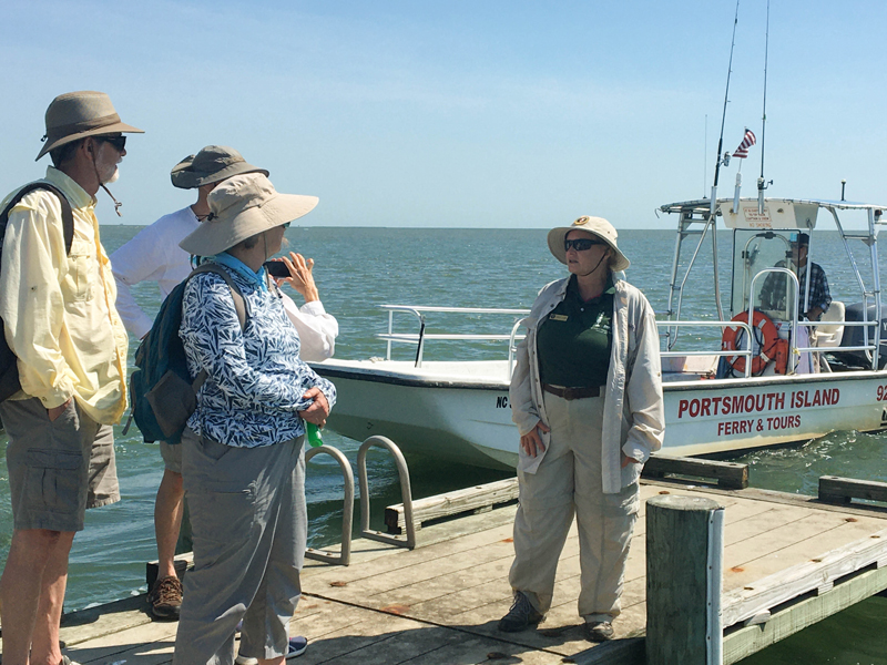 Kathi Dunn greets visistors at the Portsmouth dock