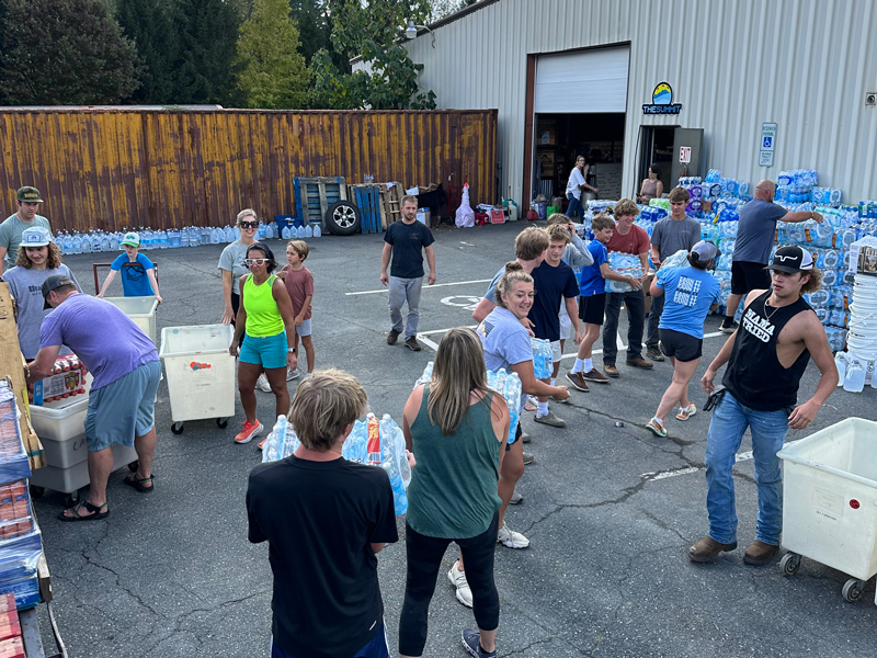 WNC Volunteers move supplies in Boone