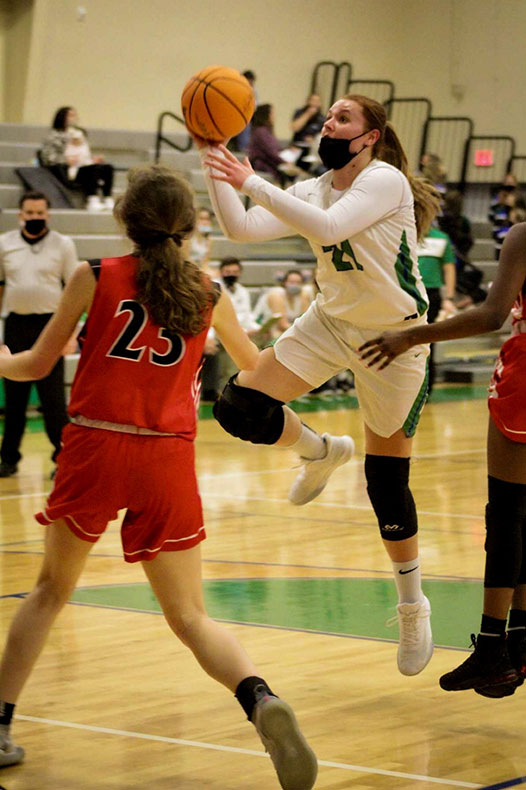 Kristen shooting at game