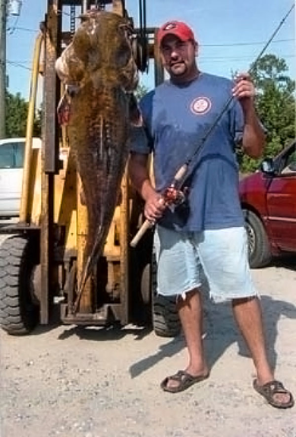 Man with catfish