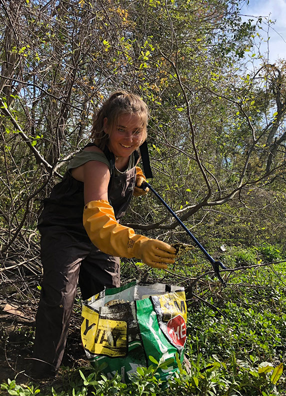 picking up plastic
